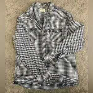 Large (but fits like a medium) button down shirt. a little small on me, I’m 6 ft